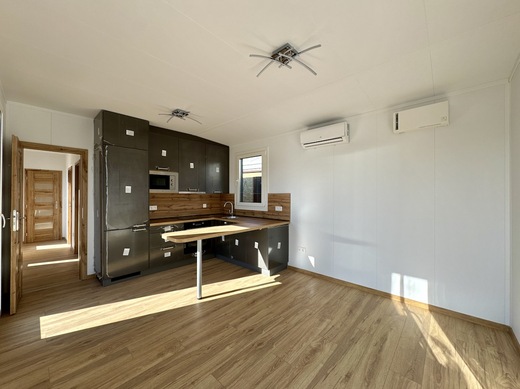 Kitchen with Living Room – Super Arktik Family Mobile Home