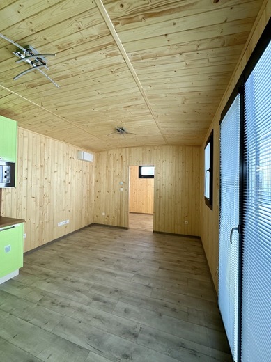 Wood Clad Living Room Mobile Home | Cozy Interior Design