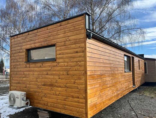 Mobile Home with Single Pitch Roof, Wooden Facade and Air Conditioning