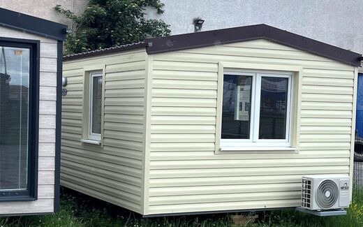 Modern Mobile Home with Yellow Facade | Bright Exterior