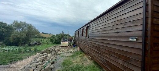 alisander Wood Clad Mobile Home – Rear View Exterior
