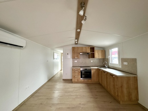 Living Room and Kitchen in Super Arktik® Mobile Home