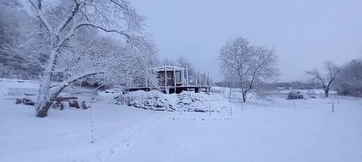 Super Arktik Mobile Home on Winter Pond Shore