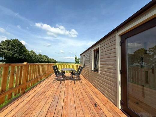 Outdoor terrace seating | Mobile home stay